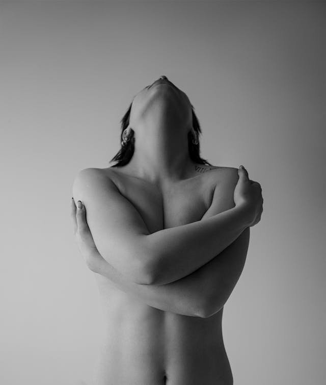 a person with arms crossed